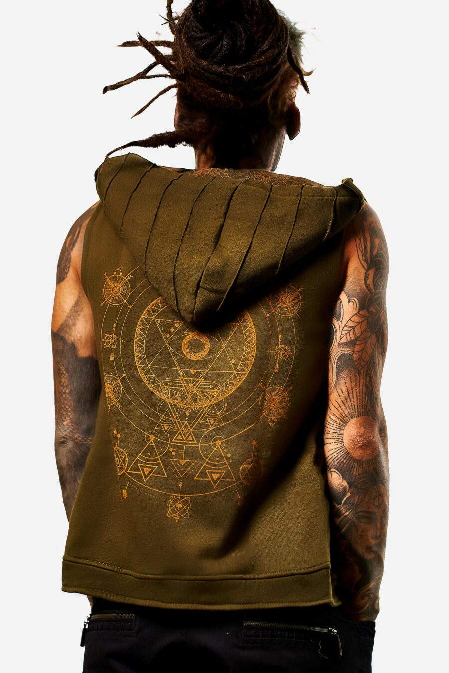 Explore Avanyah Clothing for the green Tan Thora vest for men, showcasing exclusive handmade silk screen art, perfect for festival goers and lovers of alternative streetwear.