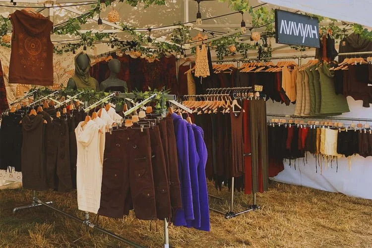 Avanyah’s stall at psychedelic trance festivals, markets, fairs and other events showcasing rave clothing, festival fashion and wearable art.